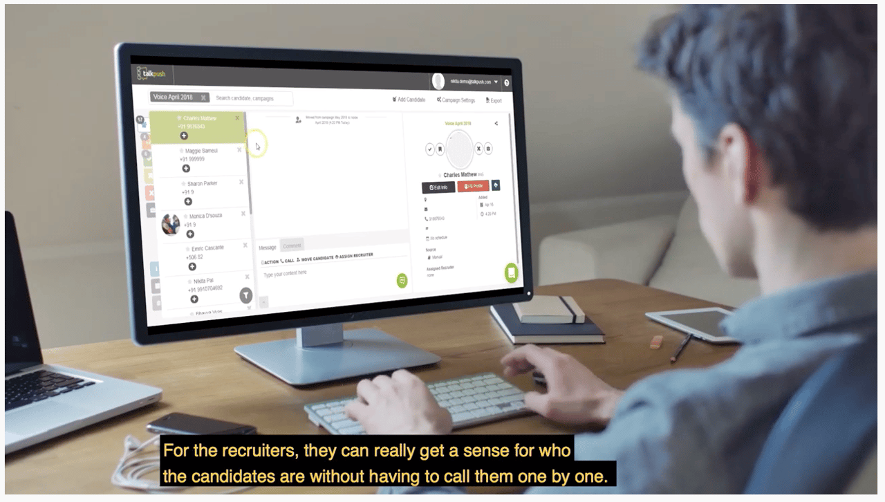 Vidéo sur l'étude de cas de Talkpush Recruiter using Talkpush software looking at computer screen